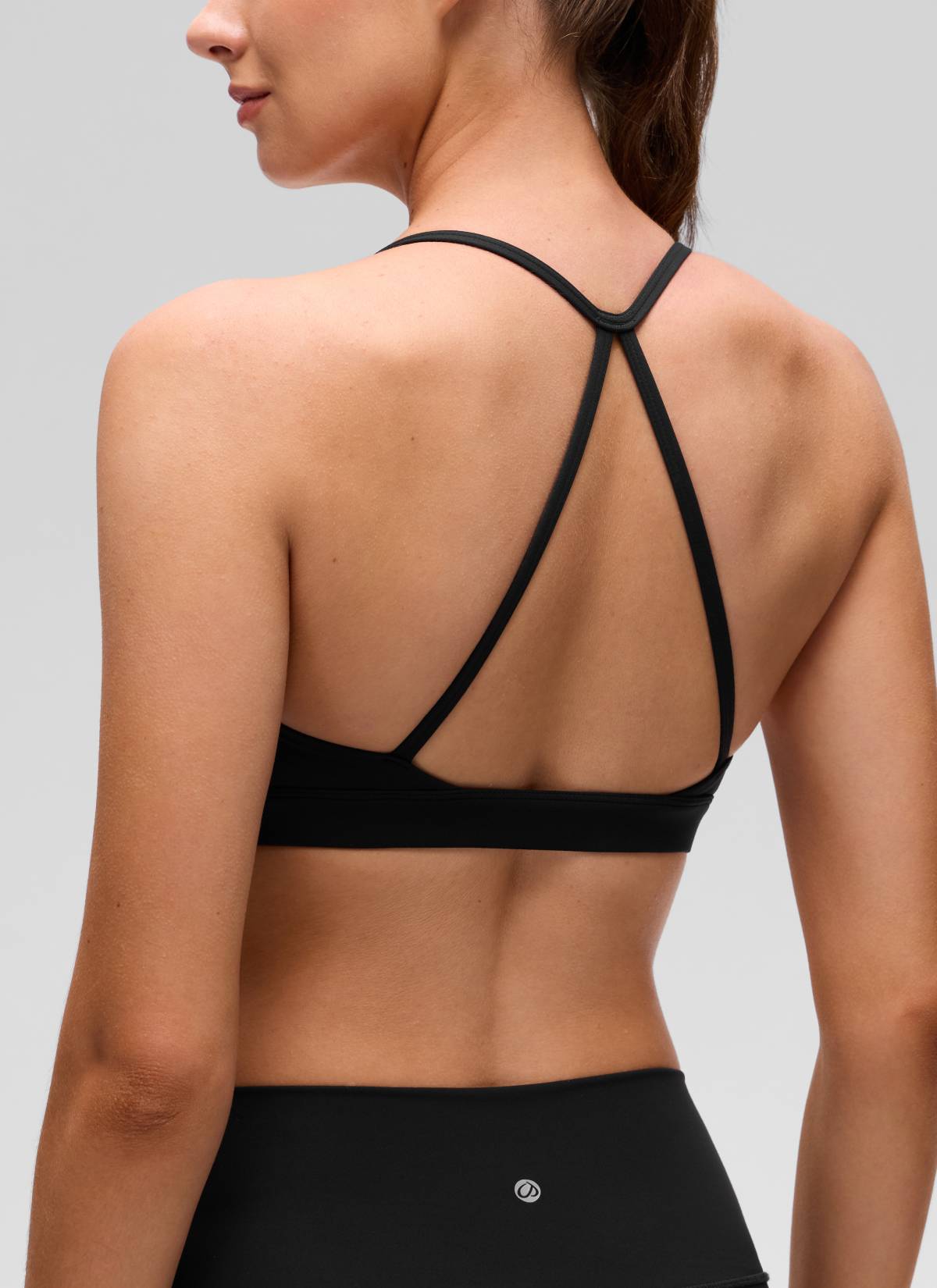 Áo lót thể thao CRZ YOGA dành cho nữ, kiểu cổ tròn và dây chéo sau lưng, chất liệu vải " Butterluxe ", màu đen