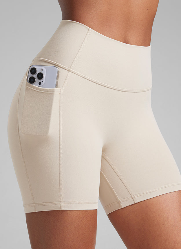 CRZ YOGA Butterlift Quần short đạp xe dành cho nữ giúp nâng mông, không đường may phía trước, có túi, dài 5 inch, màu Mojave Tan