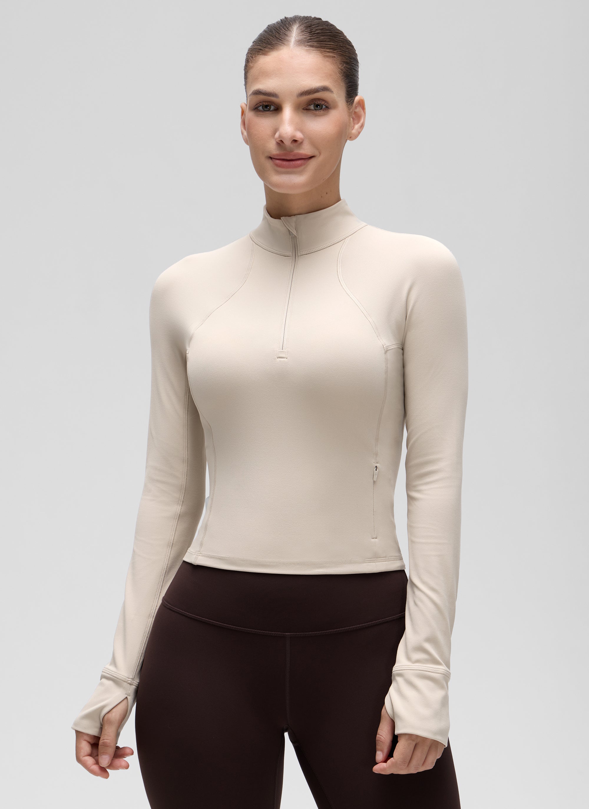 Áo thun yoga ôm sát dành cho nữ CRZ YOGA, mẫu “ Butterluxe ”, tay dài, khóa kéo nửa cổ, màu Mojave Tan