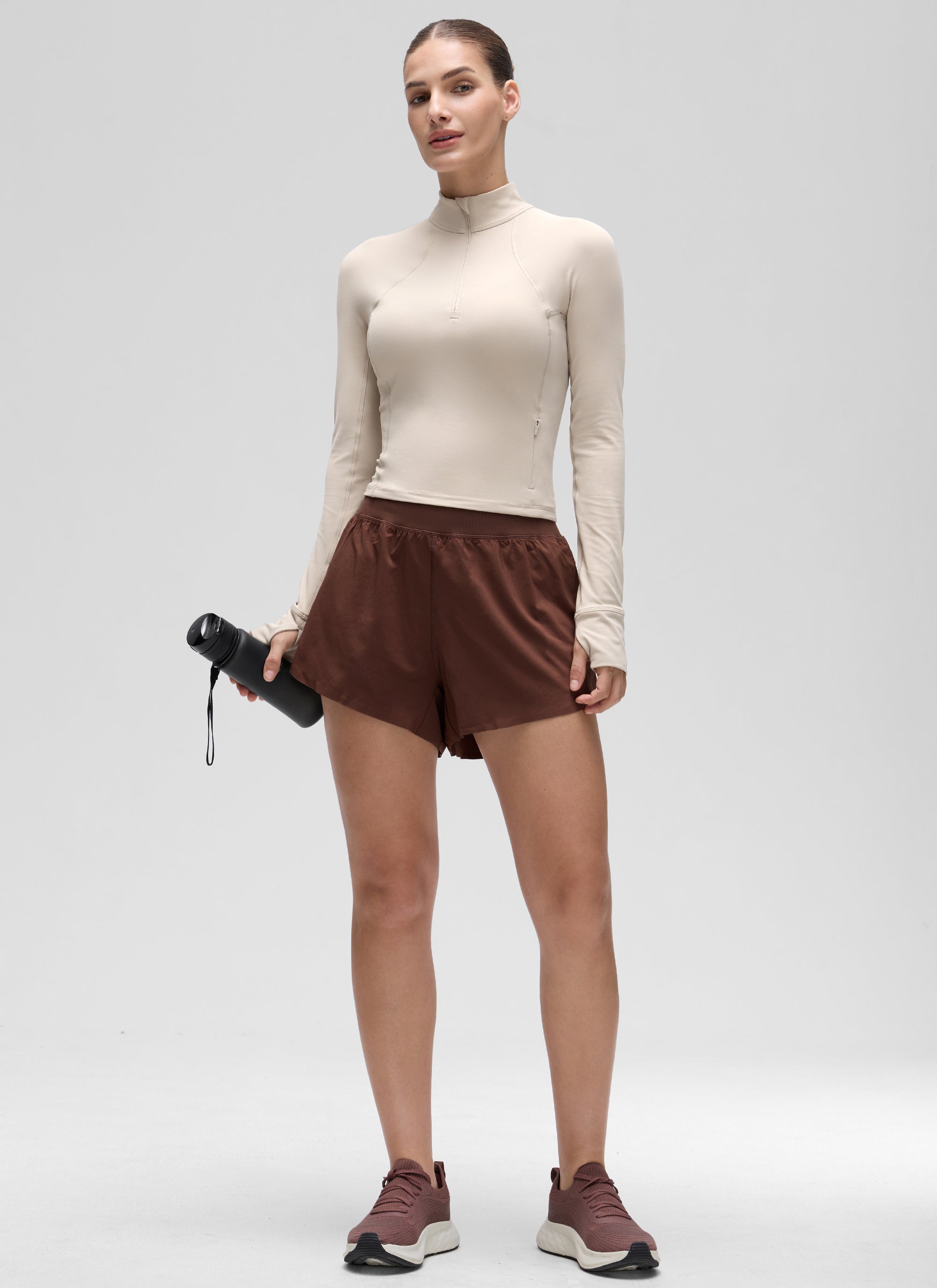 Áo thun yoga ôm sát dành cho nữ CRZ YOGA, mẫu “ Butterluxe ”, tay dài, khóa kéo nửa cổ, màu Mojave Tan