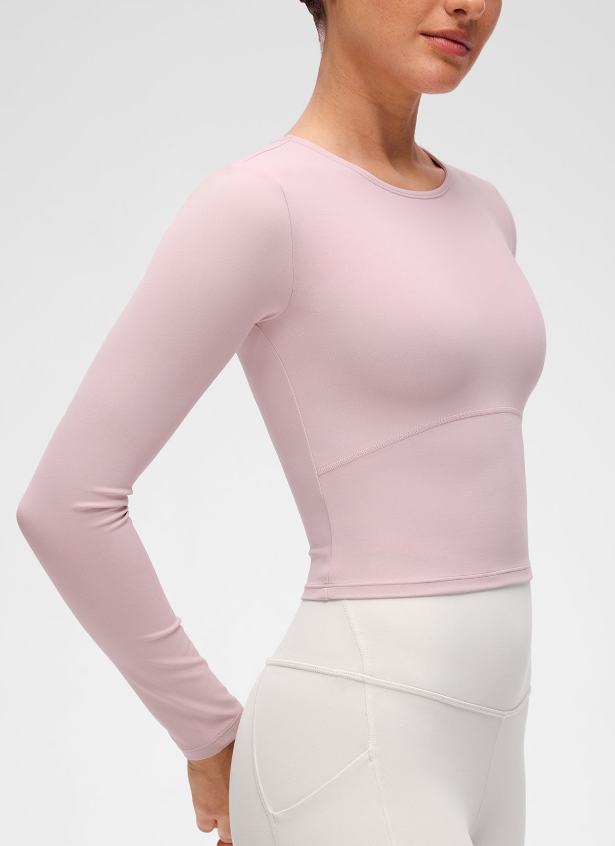 Butterluxe CRZ YOGA Áo thun yoga nữ ôm sát, kiểu crop top, tay dài, đường may phía trước, màu hồng nhạt